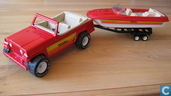 Tonka jeepster, boat and black tandem axel trailer
