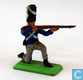 Soldier kneeling and shooting