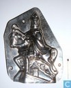 Sinterklaas te paard op dak
