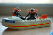Zodiac with two police divers