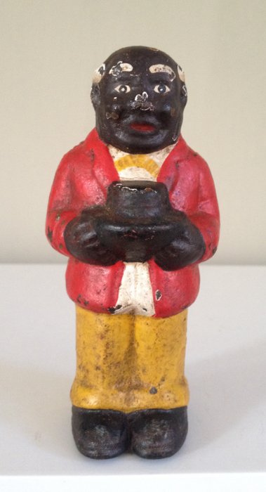 Old cast iron piggy bank of"Uncle Remus"