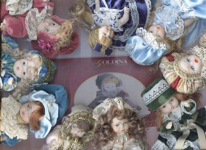 9 Goldina porcelain dolls