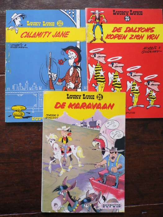 Lucky Luke - De Karavaan, De Daltons kopen zich vrij en Calamity Jane - sc  - 1964/1967 - 1e druk - uitgeverij Dupuis