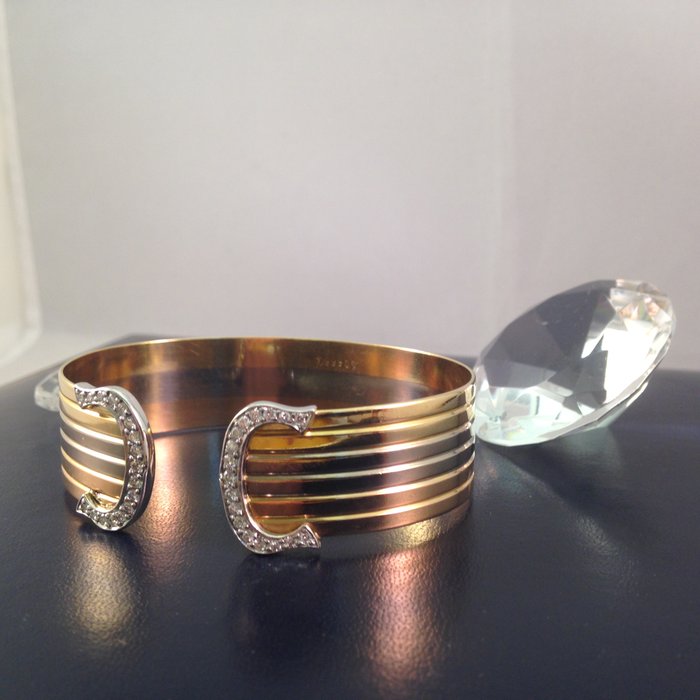 Cartier - Double C-design bracelet with brilliant cut diamonds - Catawiki