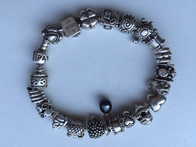 Bracciale Pandora completo di charm in argento - Catawiki