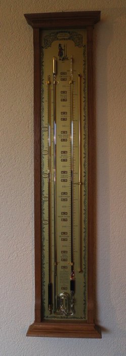 HUYGENS - contra barometer met houten omlijsting.