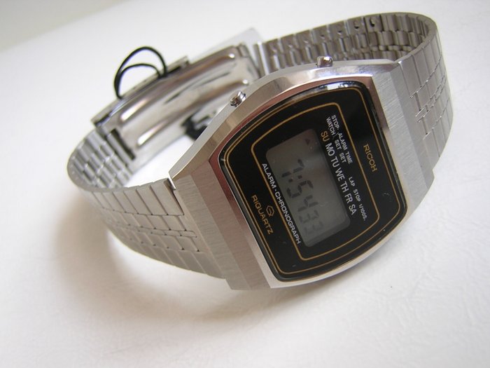Ricoh RIQuartz Digital LCD Watch for men’s circa 1980.