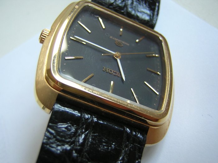 Ricoh Quarz Armbanduhr ca. 1975 für Herren.