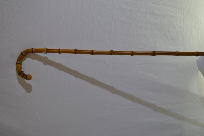 Charlie Chaplin - Chaplin owned bamboo cane - original piece - with yellow metal collar inscribed - Christie's auction 1994
