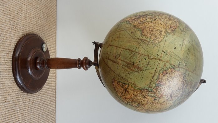 Antique globe on walnut base with compass