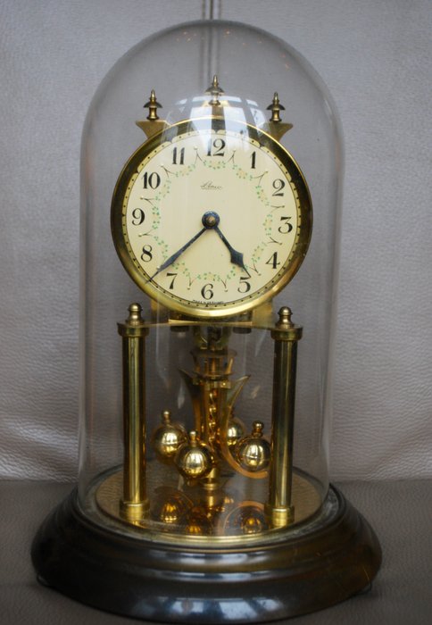 Orologio con pendolo a torsione tedesco sotto campana di vetro - Linco - Anni '60