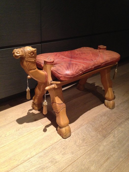 Old vintage leather camel saddle (stool)