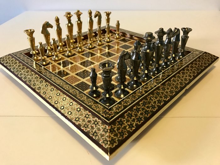 Bronze Arabian chess set with a chessboard of gold, bone and wood