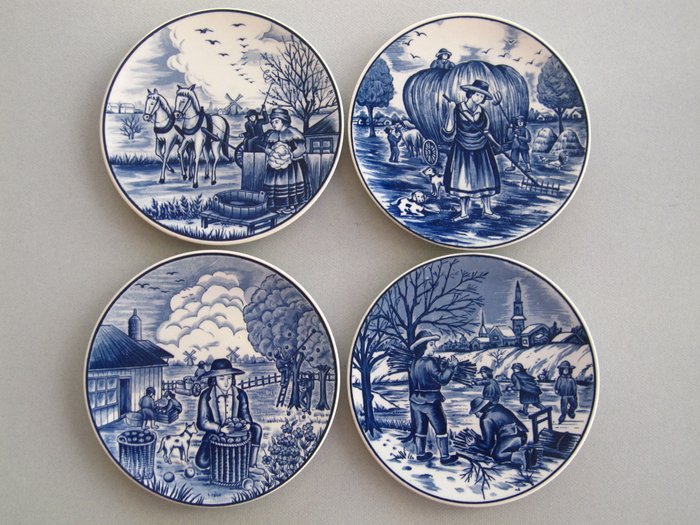 Goedewaagen - four Delft blue wall plates  with the 4 seasons