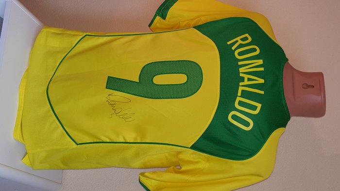 Ronaldo Luis Nazário de Lima - Originally signed shirt Brazil + COA.