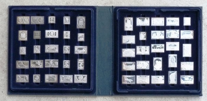 Franklin Mint -  Sammlerbox von 50 Briefmarken in massiven Silber, Jahre 1980 (620 g)