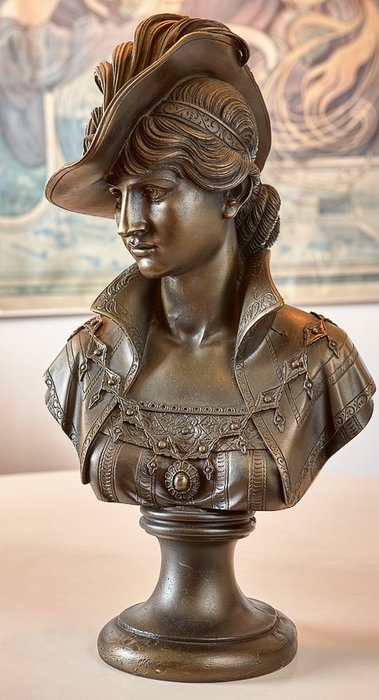 A. Giomanelli Comt des Arts L&S - Réplique art déco du buste d'une femme, résine synthétique de couleur bronze