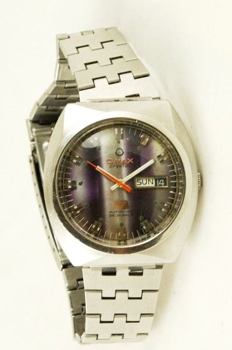OMAX CRYSTAL  SWISS  heren  horloge van jaren 70