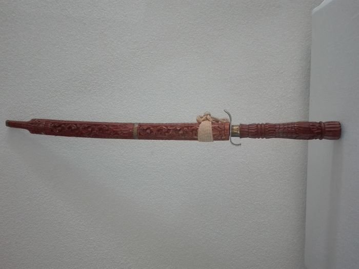 Balinese sabre / sword with hand-carved wooden sleeve

