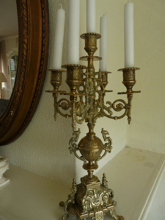 Antique and classic-looking 5 arm brass candlestick

