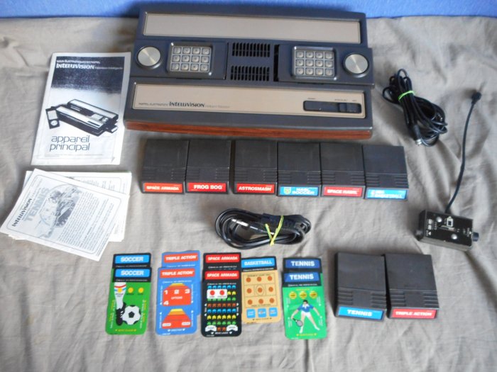 Mattel Intellivision console with cables, controllers and 8 games