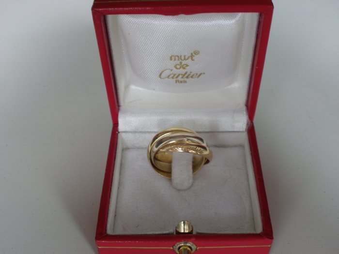 selling cartier trinity ring