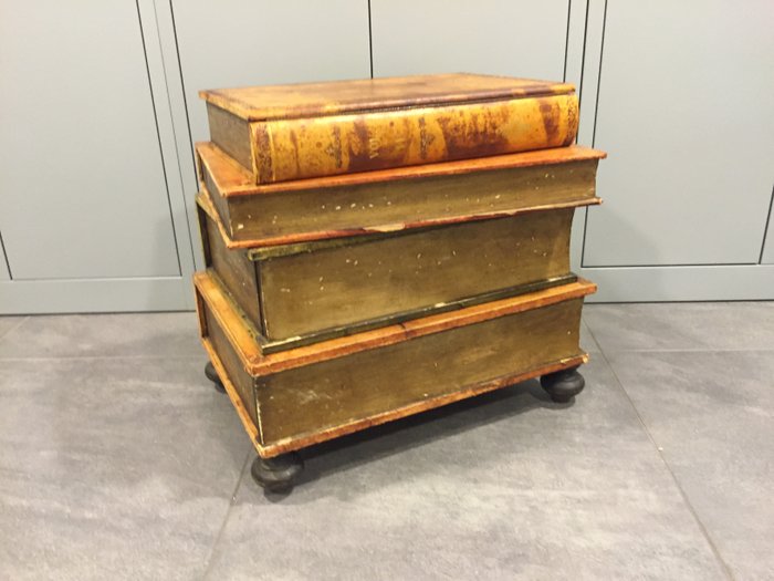 Side Table Or Cabinet That Looks Like A Large Pile Of Old Books
