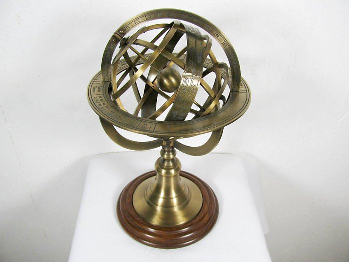 Armillary sphere in cast bronze on a wooden base