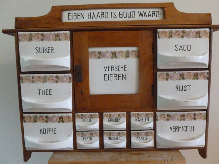 Old Dutch spice cabinet, "Eigen haard is goud waard".