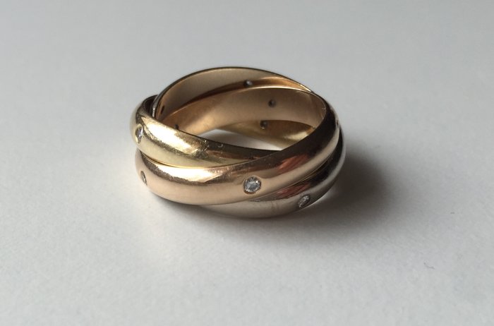cartier trinity ring auction