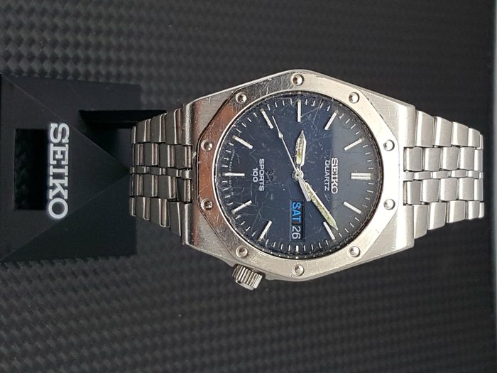 Seiko SQ 100 Sports - men's wristwatch - 1980s. - Catawiki