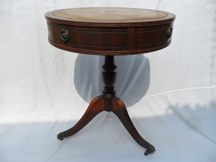 A Round Table Drum With Two, Leather Drum Table