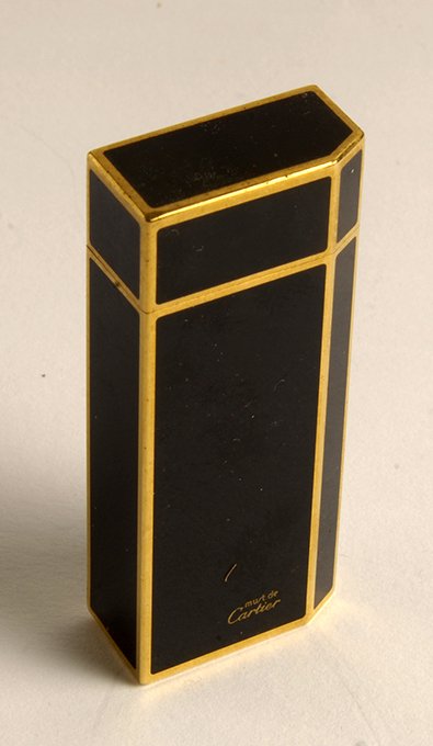 Black gold plated Cartier lighter from 80s - Catawiki