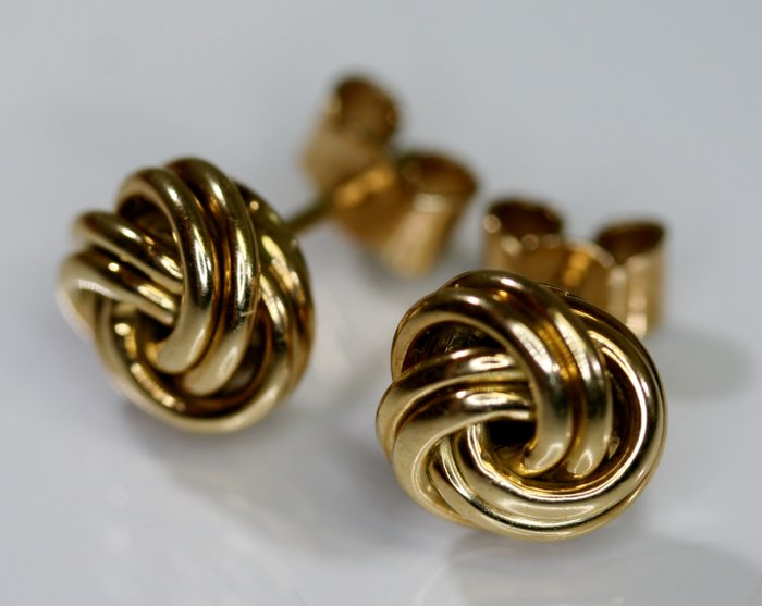 cartier gold knot earrings