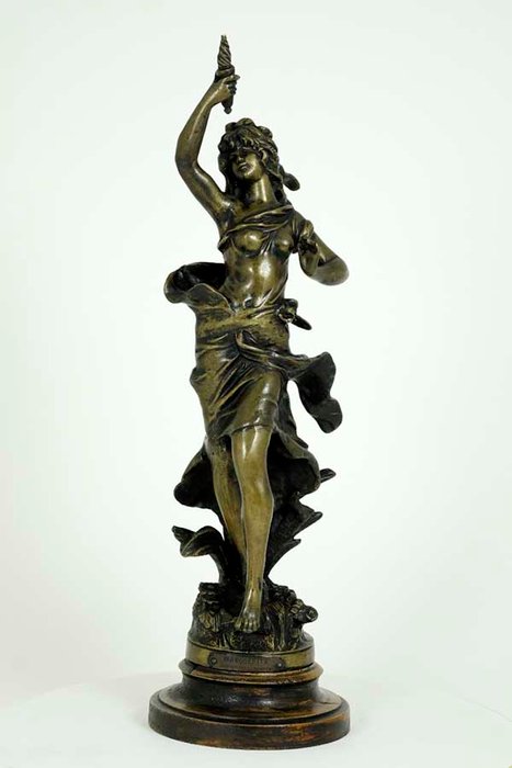 A bronzed zinc alloy sculpture of a lady holding a torch titled "Marguerite", after Auguste Moreau, 20th century