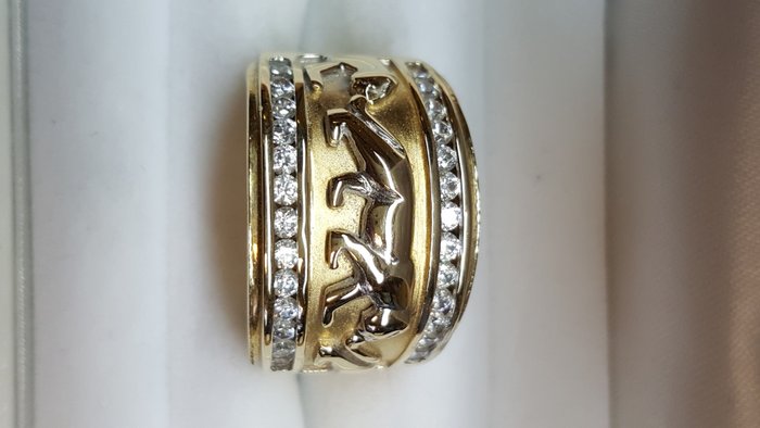 gold puma ring