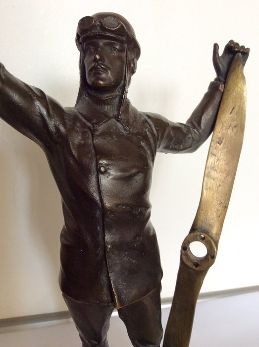Bronze statue of a German WWI pilot with propeller 