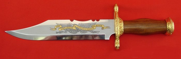 Franklin Mint-The John Wayne Commemorative Bowie Knife with certificate-24 carat gold plated and sterling silver accents-very beautiful.