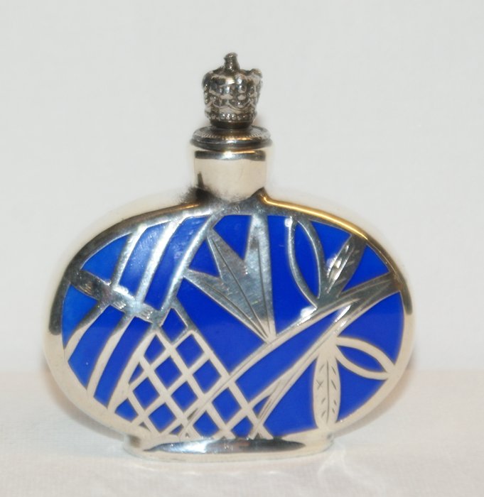 Art Deco perfume bottle of porcelain with silver overlay