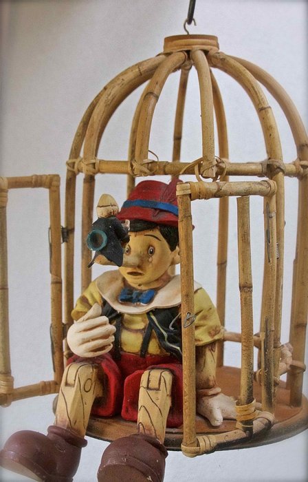 Pinocchio in bamboo cage