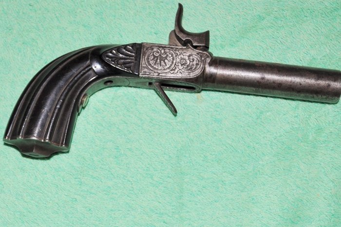 old break action single shot pistol of the 19th century