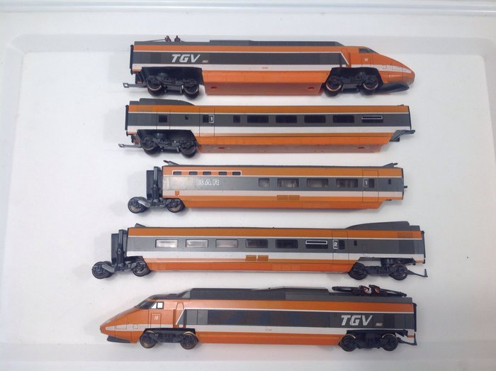 Lima H0 - TGV 5 piece train set with alternating red and yellow lighting
