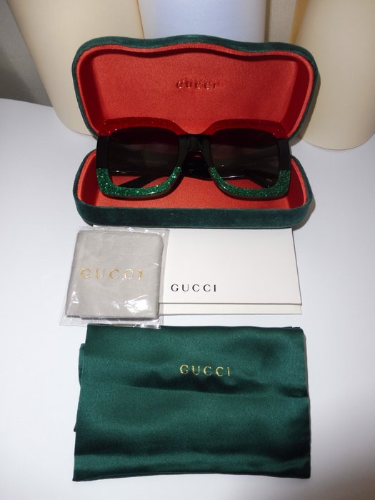 red black and green gucci glasses