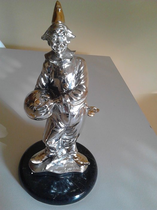 Statue of a clown in laminated silver by G. Mariani