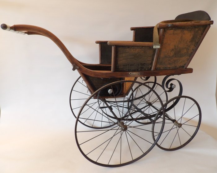 antique wooden baby stroller