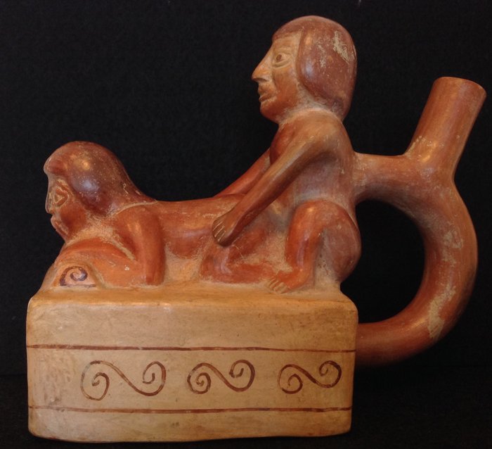 Pre-Columbian Moche culture erotic pottery depicting a figure lying on her ...