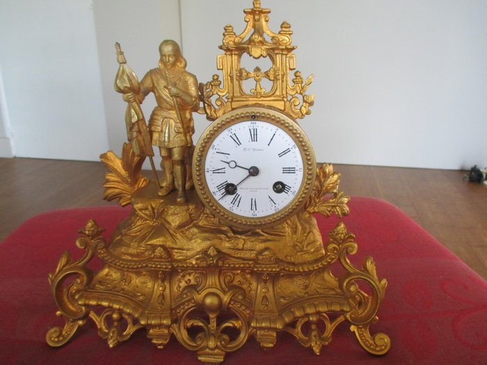 Clock from the end of the 19th century, by Brunfaut and Wurtel, in golden regulus.