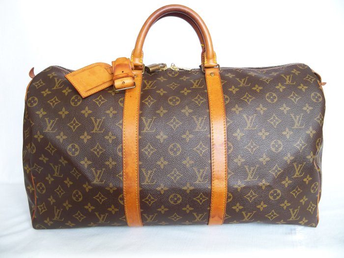 Louis Vuitton Keepall 50 + LV accessories - **No reserve price** - Catawiki