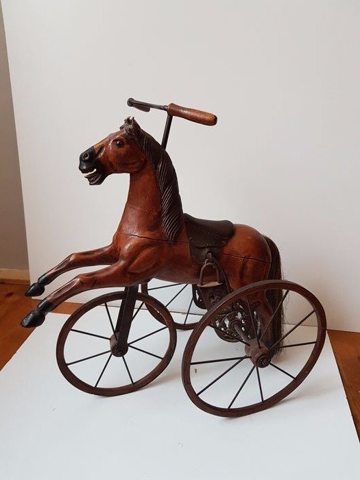 Tricycle in the shape of a horse