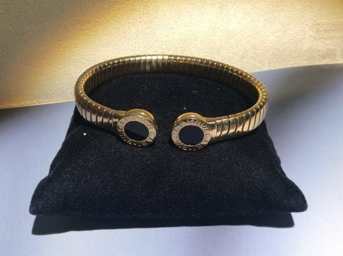 Bulgari 'Tubogas' bracelet with black onyx disk end-pieces - 18 kt gold - size L - 7.2 cm